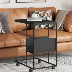 Tafels*vidaXL Bijzettafel met wieltjes 55x36x63,5 cm bewerkt hout Zwart